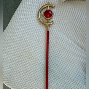 Frieren anime cosplay staff
- Red and Gold Staff with Crescent Design